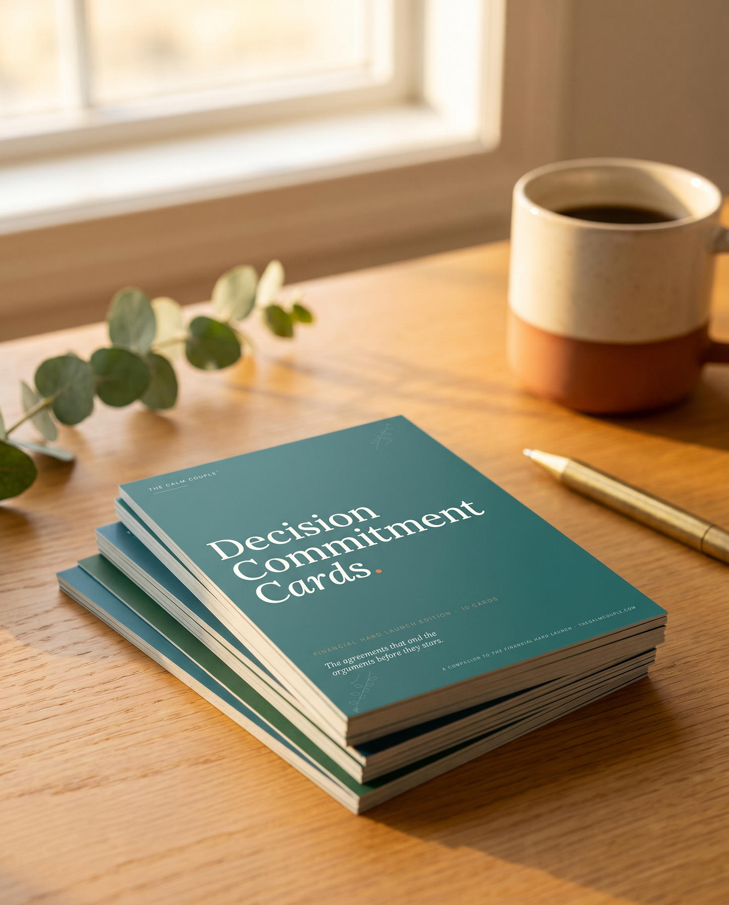 Stack of Decision Commitment Cards on a warm desk with coffee